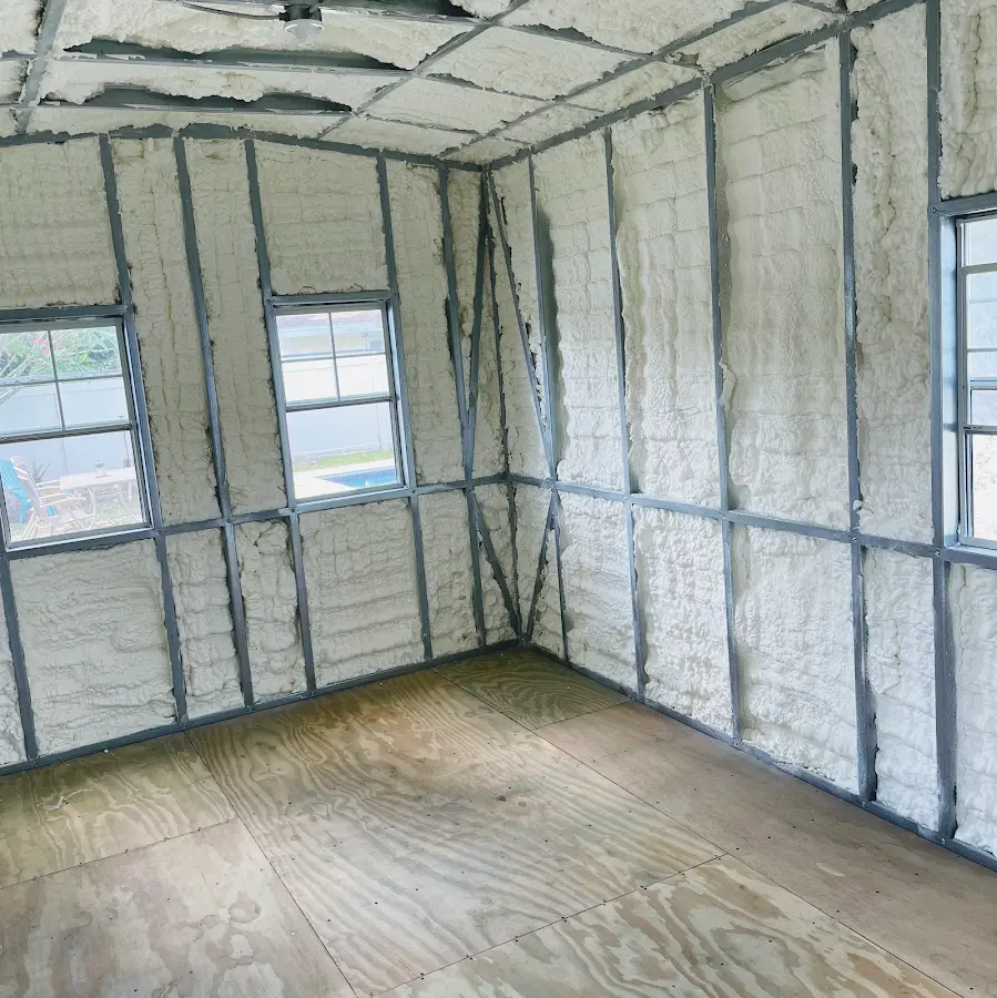 Closed-cell spray foam insulation applied to wall cavities in a residential project in Calcutta